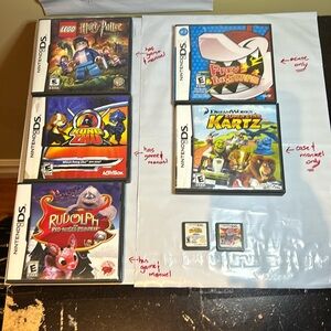 Lot of 5 DS games some‎ with case and manuels some empty case as shown